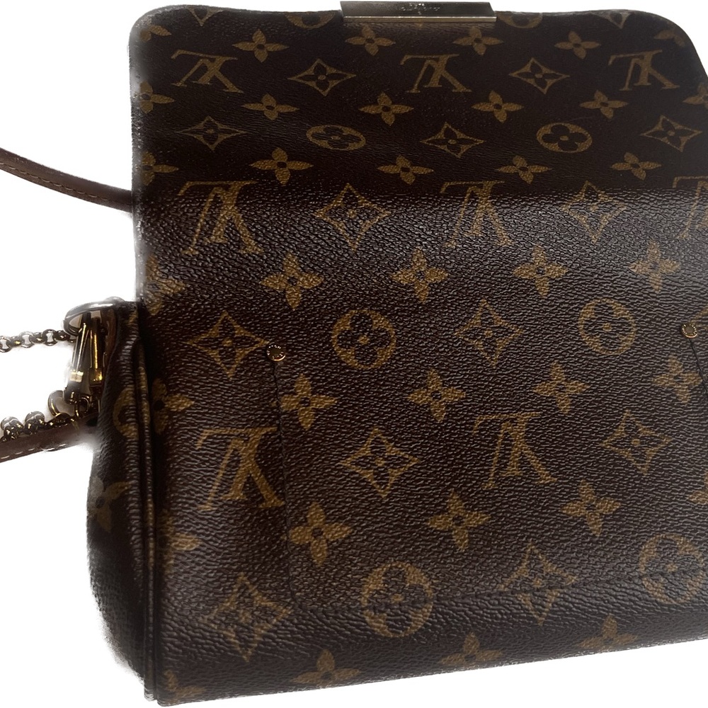 Louis Vuitton crossbody with chain and strap